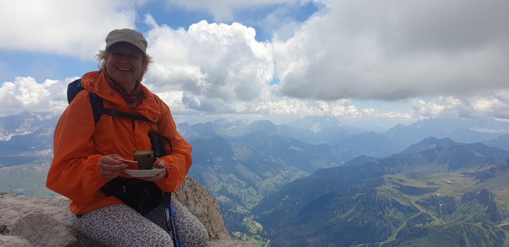 On top of the world with a cup of tea at Piz Boa, Italian Dolomites